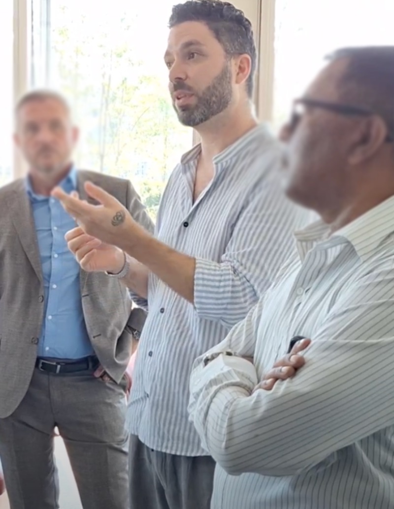 Startup coach interacting with a founder in a focused strategy session